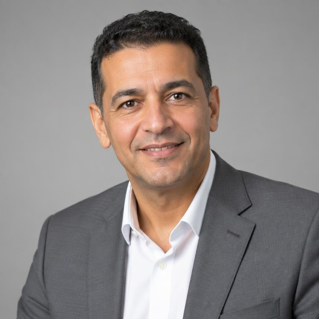 Portrait of a man in a suit trainer
