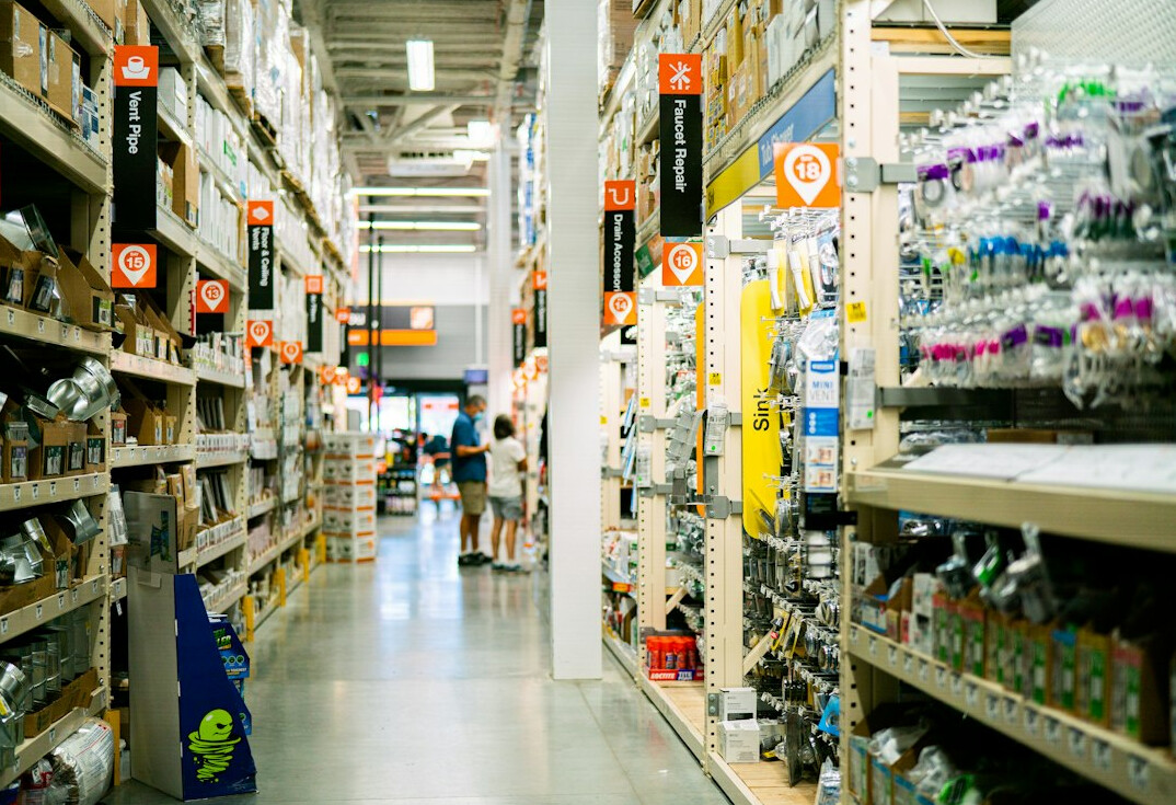 Supermarket aisle with neatly arranged products on shelves